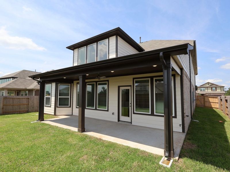 Front exterior of a new home in Summerview, Fulshear, TX, highlighting curb appeal (Image 9).