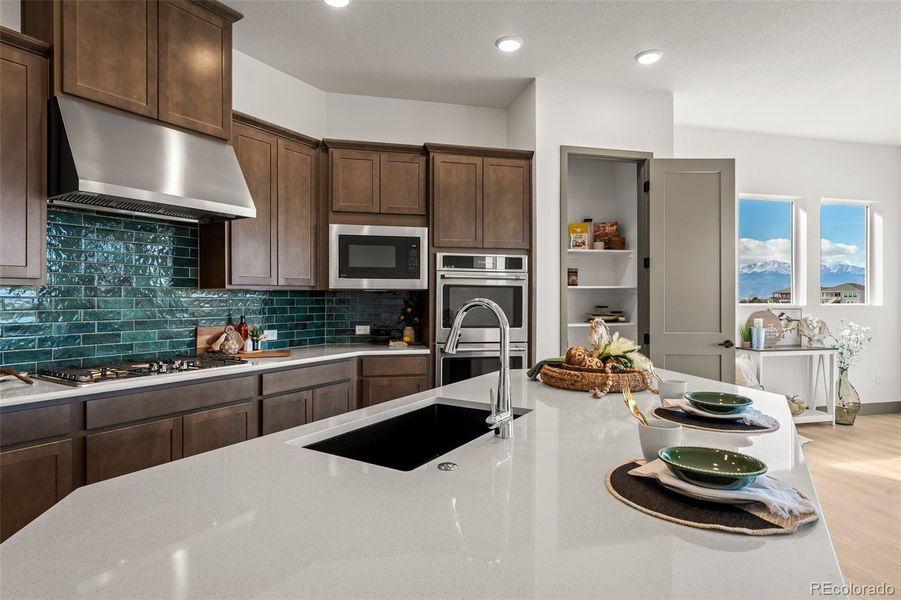 Furnished interior view inside a new home in Revel Crossing at Wolf Ranch - The Panorama Collection, Colorado Springs (Image 13).