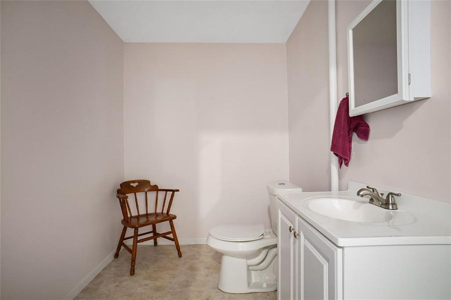 Half Bathroom off of Laundry Room