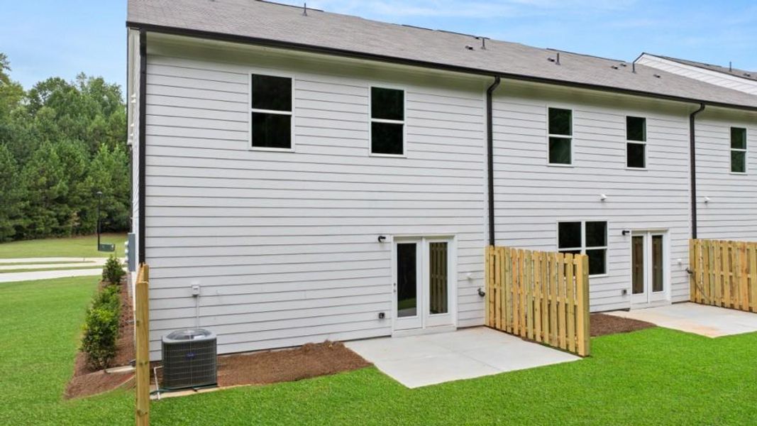 Exterior details and patio area of a home in Waypoint, Flowery Branch (Image 3).