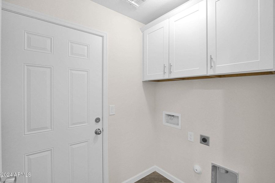 Laundry with cabinets