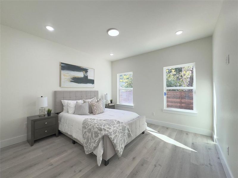 Bedroom featuring light wood-type flooring