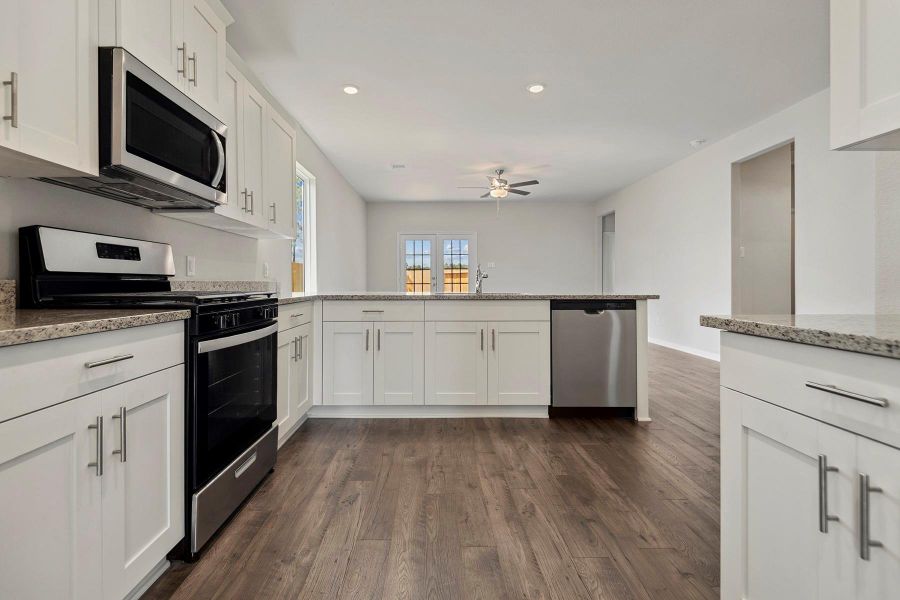 Furnished interior view inside a new home in Sweetwater Ridge, Conroe (Image 4).