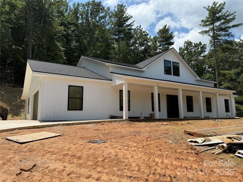 Front exterior of a new home in , Lenoir, NC, highlighting curb appeal (Image 2).