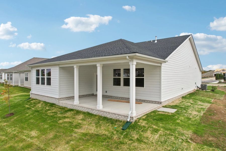 Exterior details and patio area of a home in Cedars at Cane Ridge | 55+ Community, Antioch (Image 22).