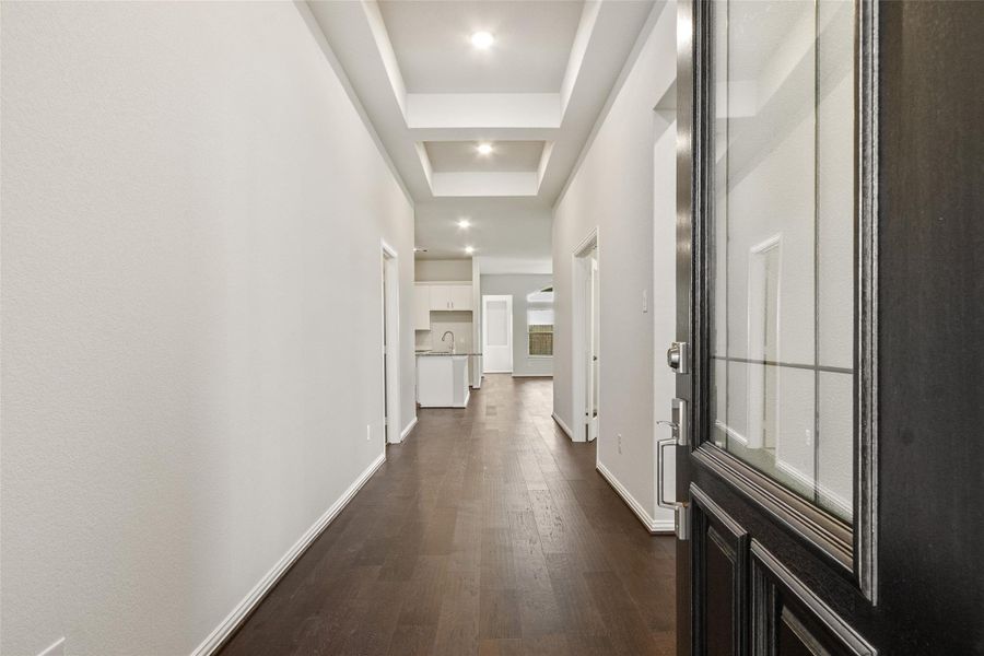 Spacious, unfurnished interior of a new home in Sunterra, Katy (Image 31).