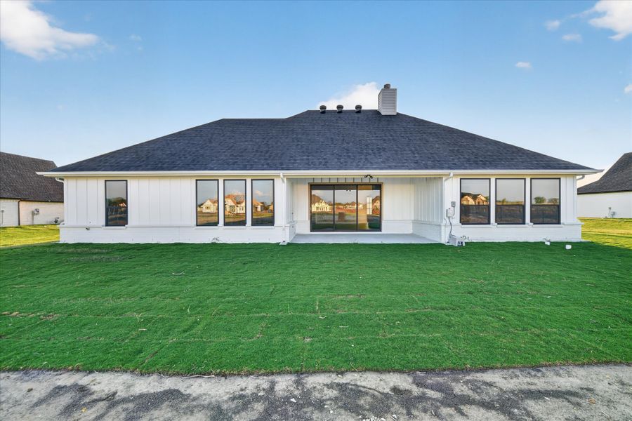 Front exterior of a new home in Paloma Ranches, Justin, TX, highlighting curb appeal (Image 24).