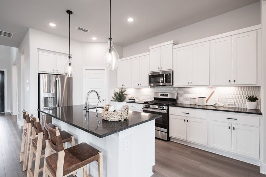 Representative furnished interior of a home built from the Tanager by Tri Pointe Homes in Oakhill Reserve 45’, Tomball (Image 10). Representative furnished interior of a home built from the Tanager by Tri Pointe Homes in Oakhill Reserve 45’, Tomball (Image 10).