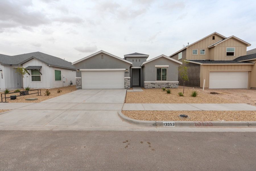 Front exterior of a new home in Summer Sky North, El Paso, TX, highlighting curb appeal (Image 19).