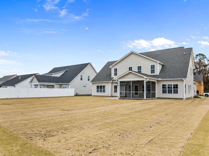 Exterior details and patio area of a home in Eli's Ridge, Winterville (Image 28).