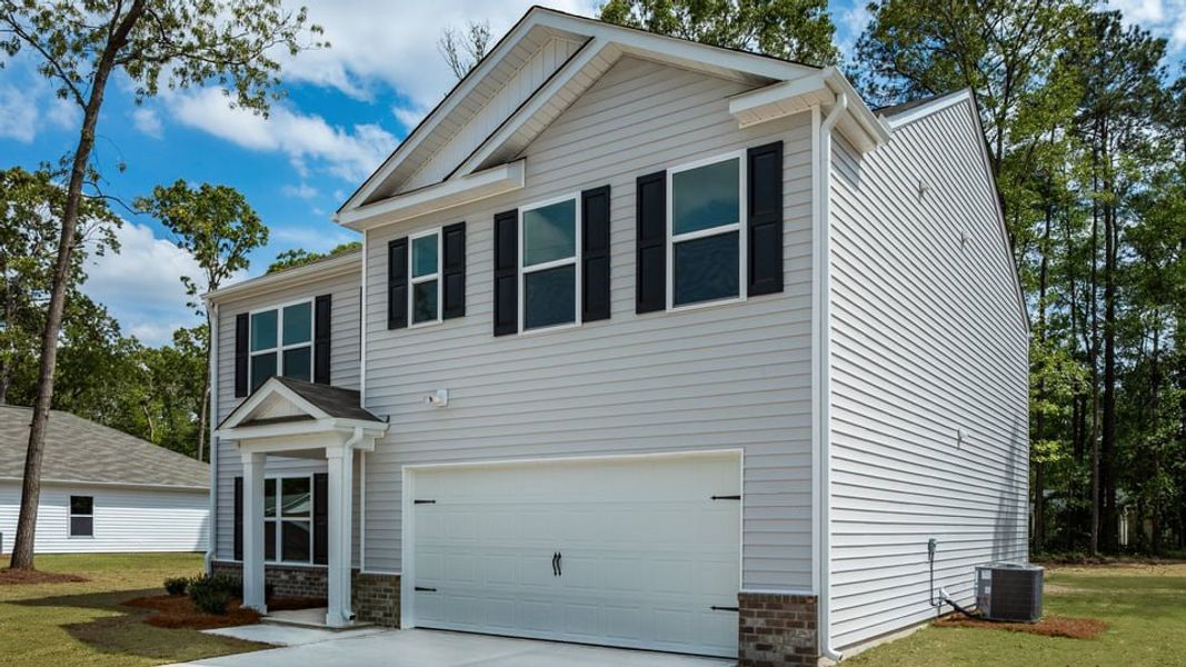 Front exterior of a new home in Blair Ridge, La Grange, NC, highlighting curb appeal (Image 18).