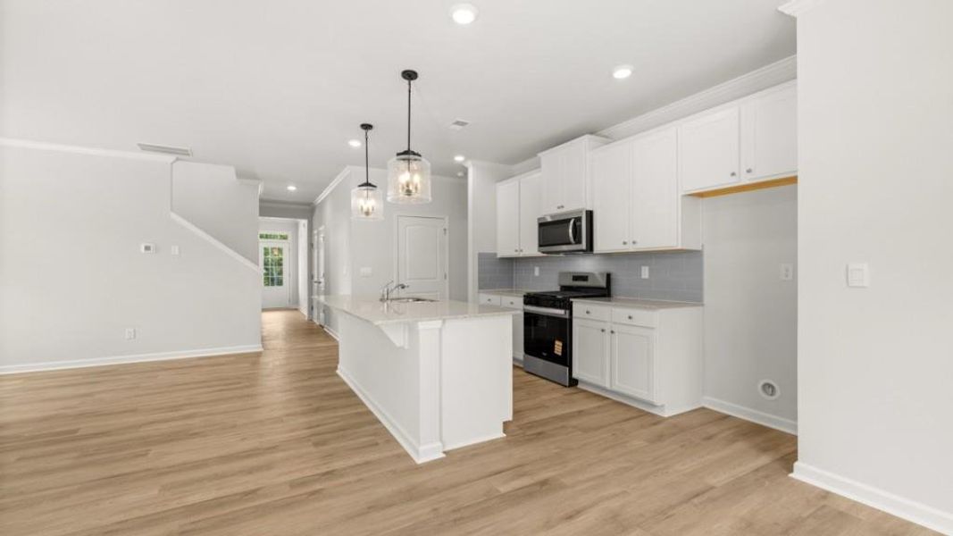 Furnished interior view inside a new home in Fairway 17 at Mirror Lake, Villa Rica (Image 5).