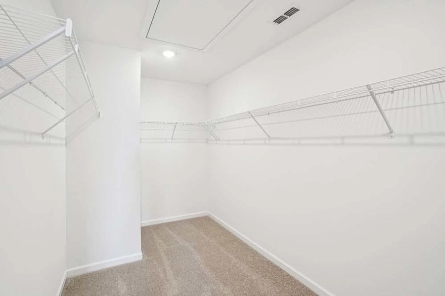 Spacious Primary Bedroom Walk-In Closet Spacious Primary Bedroom Walk-In Closet