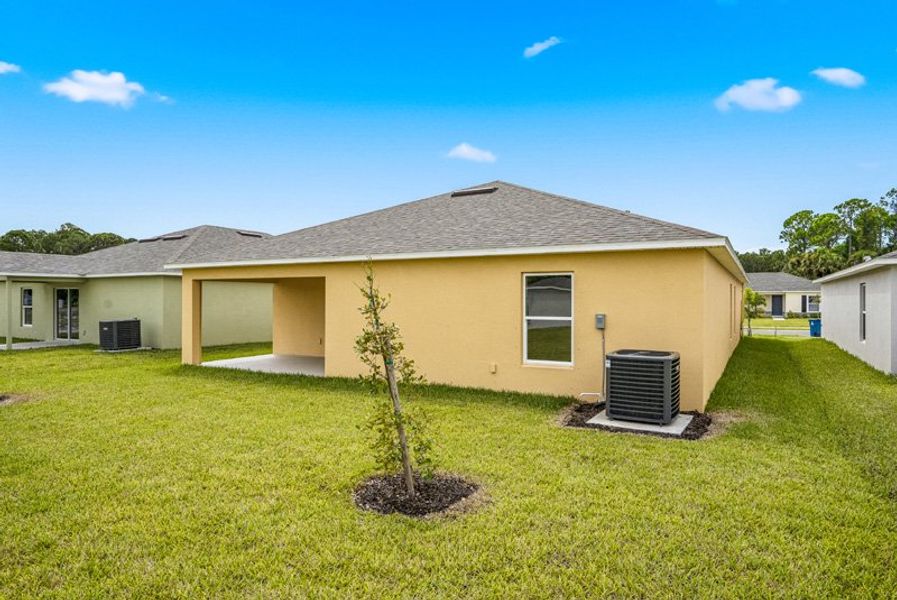Exterior details and patio area of a home in Richmond Cove, Palm Bay (Image 3). Exterior details and patio area of a home in Richmond Cove, Palm Bay (Image 3).