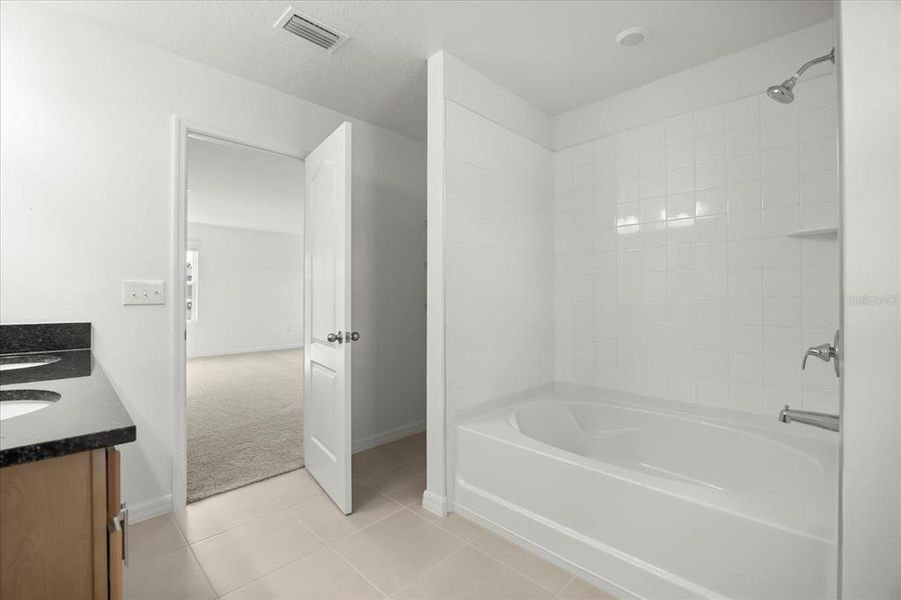 Furnished interior view inside a new home in Hickory Ranch, Auburndale (Image 11).