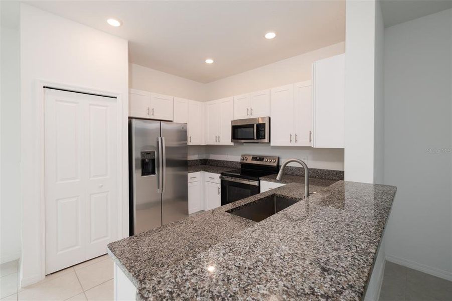 Furnished interior view inside a new home in , Land O' Lakes (Image 3).