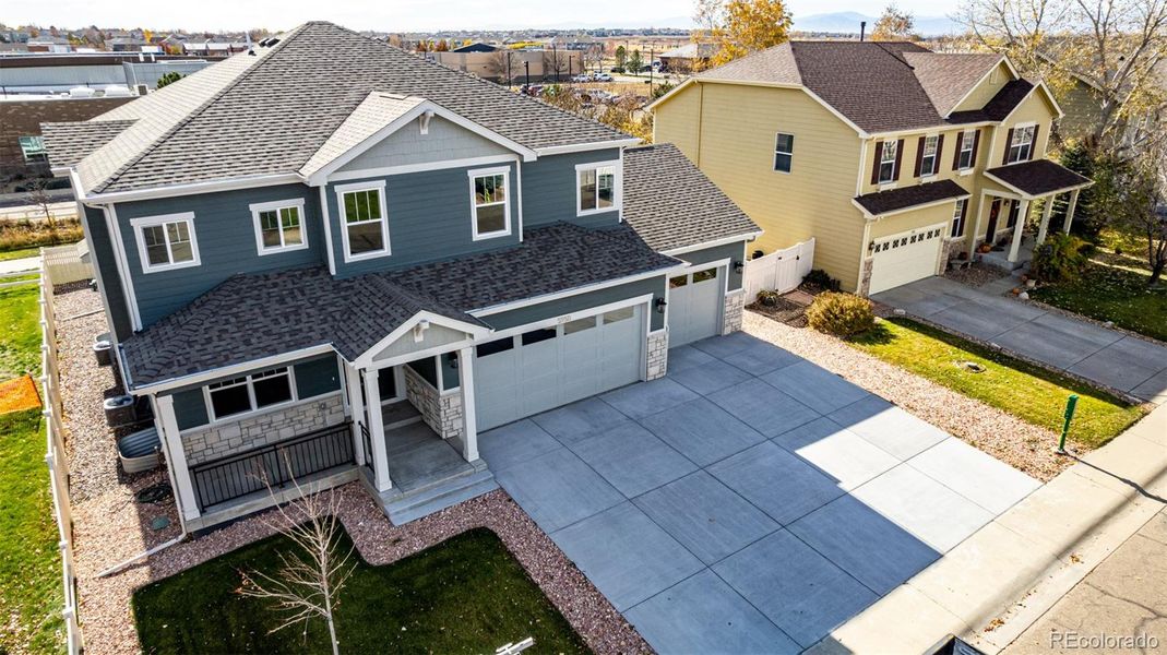 Front exterior of a new home in , Firestone, CO, highlighting curb appeal (Image 1).