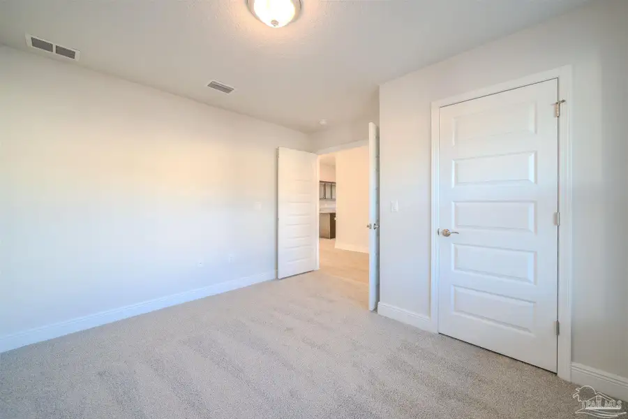 Spacious, unfurnished interior of a new home in Pine Top, Cantonment (Image 11).