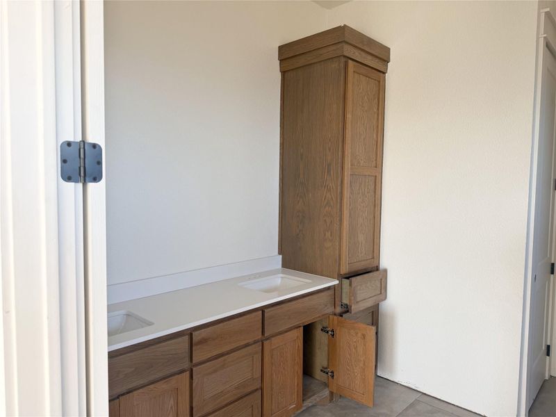 Bathroom featuring double vanity