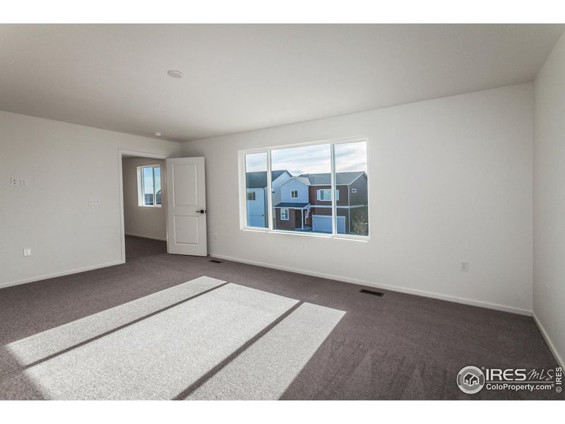 Spacious, unfurnished interior of a new home in Bloom Trailblazer Collection - Single Family Homes, Fort Collins (Image 33).
