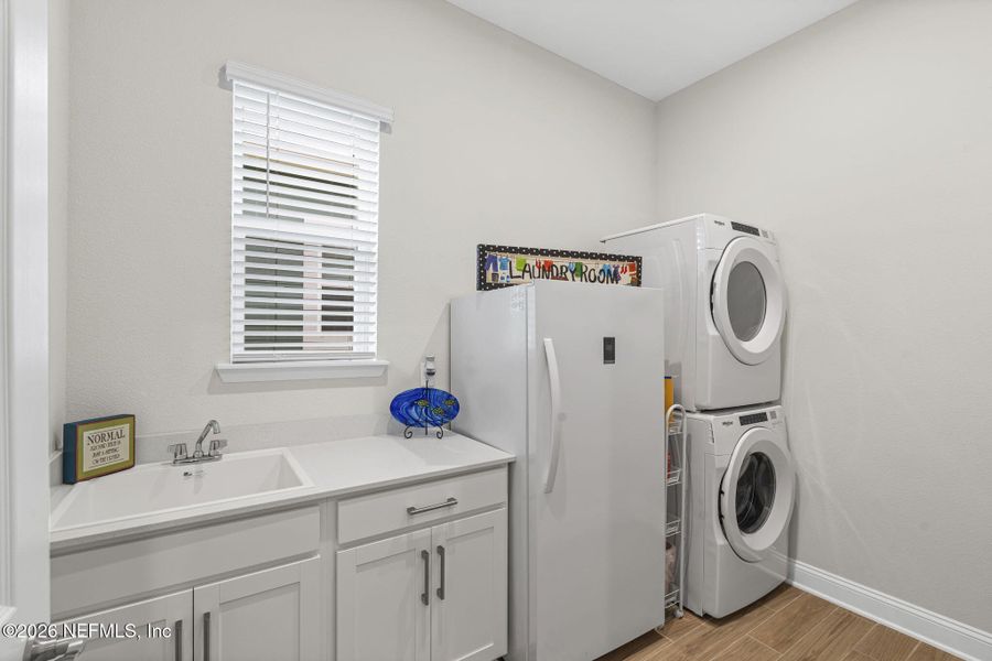 Furnished interior view inside a new home in RiverTown - WaterSong, St. Johns (Image 17).