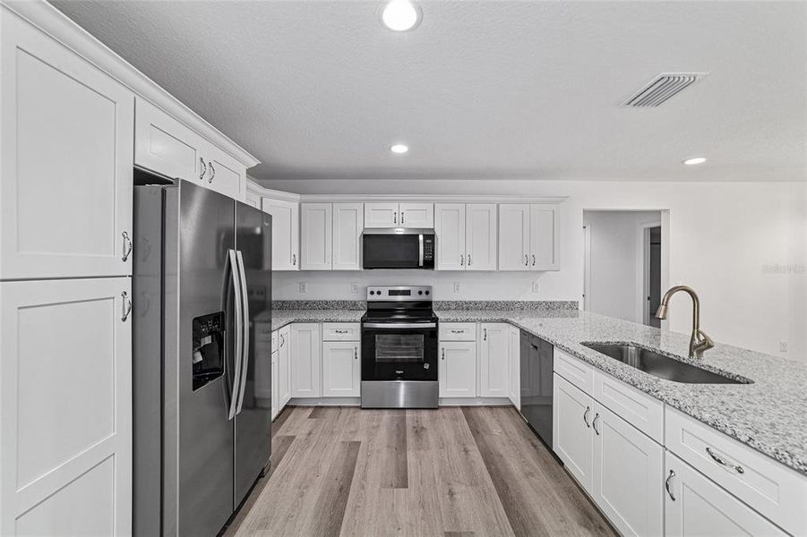 Furnished interior view inside a new home in , Dunnellon (Image 20).