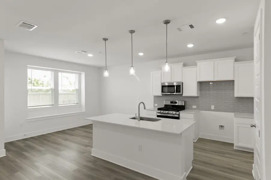 Furnished interior view inside a new home in Center 45, Round Rock (Image 6). Furnished interior view inside a new home in Center 45, Round Rock (Image 6).