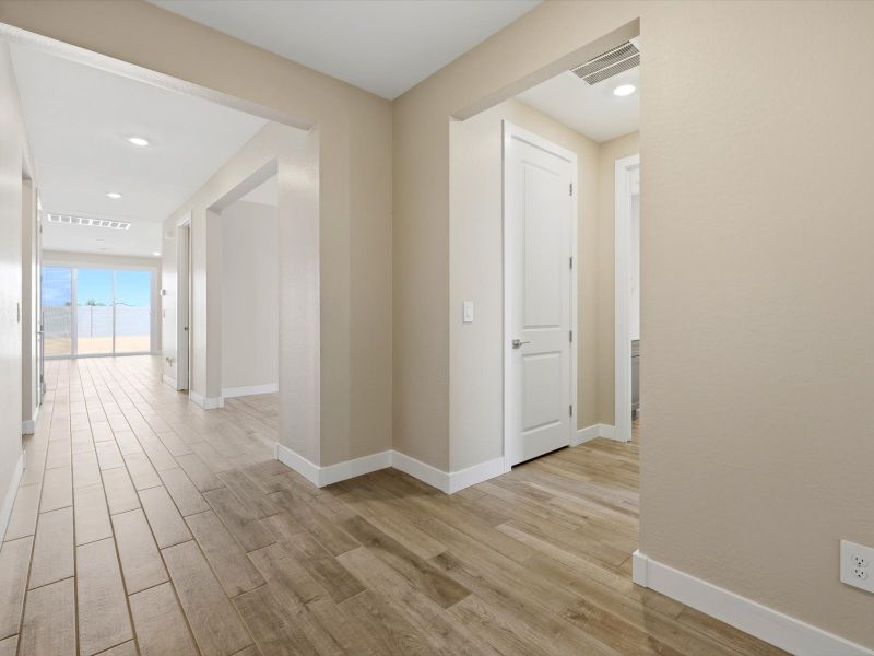 Spacious, unfurnished interior of a new home in Blossom Rock Signature Series, Apache Junction (Image 13). Spacious, unfurnished interior of a new home in Blossom Rock Signature Series, Apache Junction (Image 13).