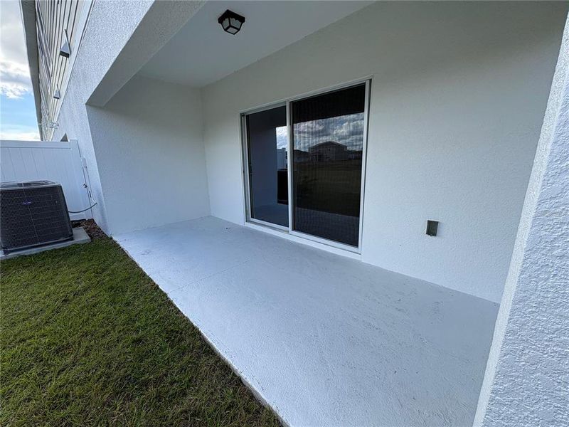 Exterior details and patio area of a home in Sky Lakes Towns, St. Cloud (Image 15).