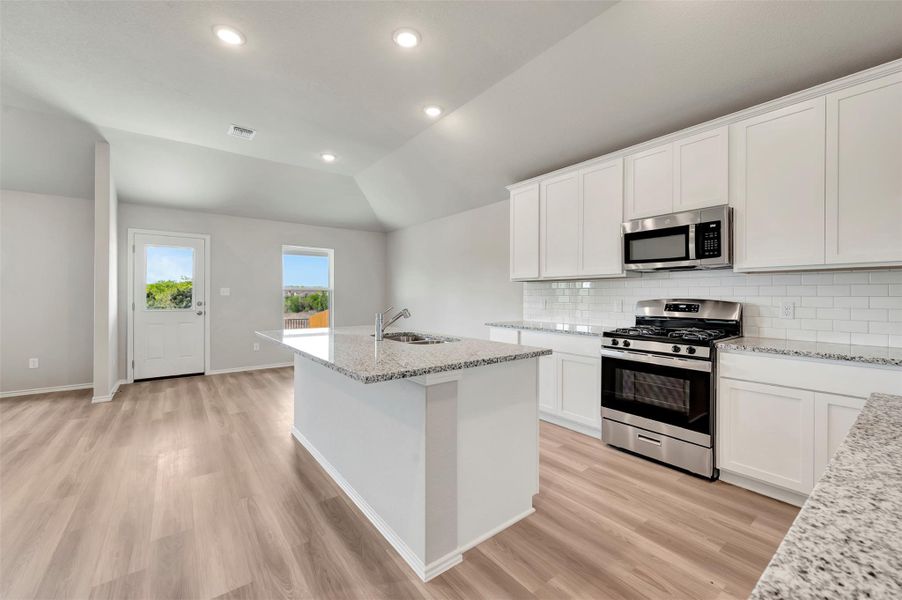 Furnished interior view inside a new home in Carillon, Manor (Image 12).