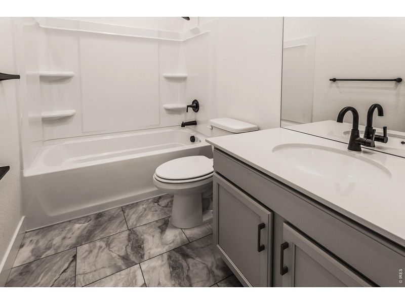 Furnished interior view inside a new home in Prairie Song Story Collection - Single Family Homes, Windsor (Image 8).