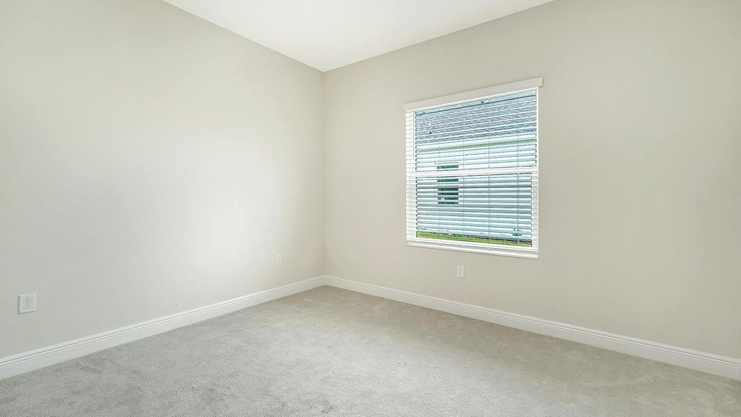 Spacious, unfurnished interior of a new home in Wildleaf Real Estate and Homes for Sale in Parrish, FL - Neal Communities, Parrish (Image 29).