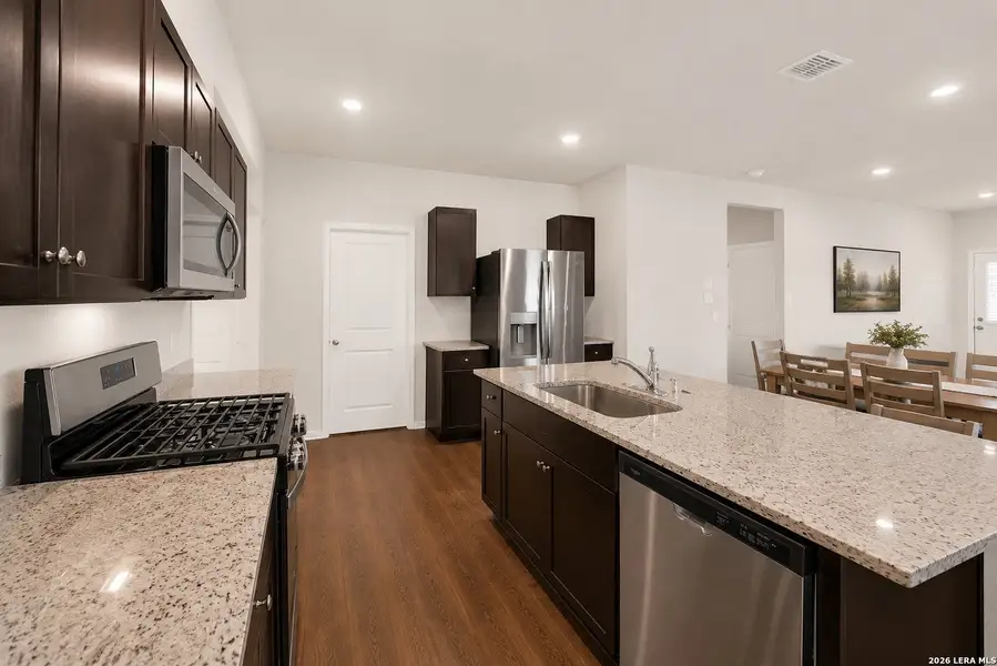 Furnished interior view inside a new home in The Links at River Bend, Floresville (Image 16). Furnished interior view inside a new home in The Links at River Bend, Floresville (Image 16).