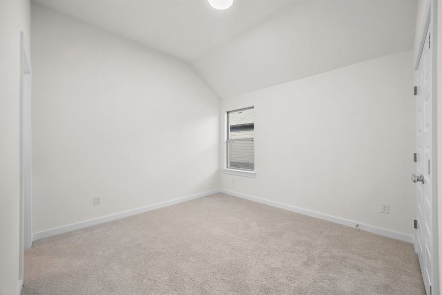 Bedroom in the Sabine home plan by Trophy Signature Homes – REPRESENTATIVE PHOTO Bedroom in the Sabine home plan by Trophy Signature Homes – REPRESENTATIVE PHOTO