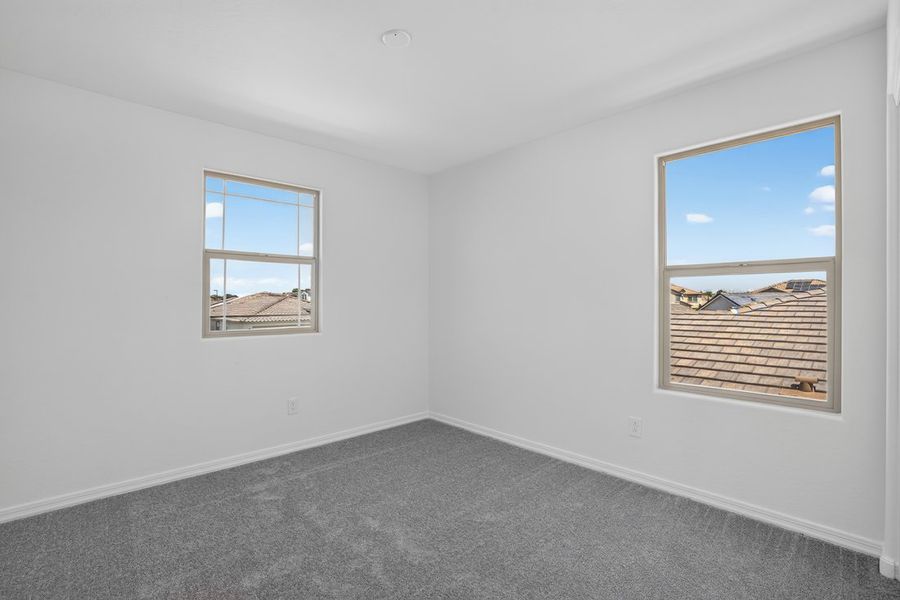 Spacious, unfurnished interior of a new home in Artisan at Asante, Surprise (Image 25).