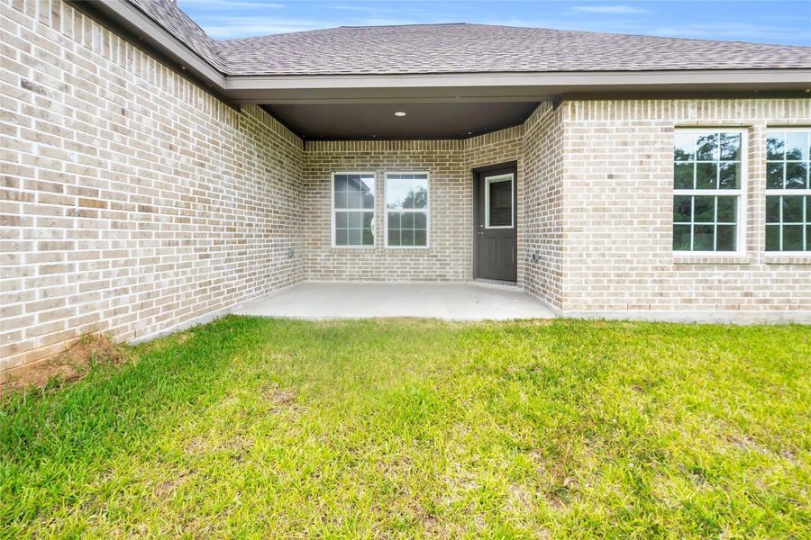 Front exterior of a new home in , Angleton, TX, highlighting curb appeal (Image 12). Front exterior of a new home in , Angleton, TX, highlighting curb appeal (Image 12).