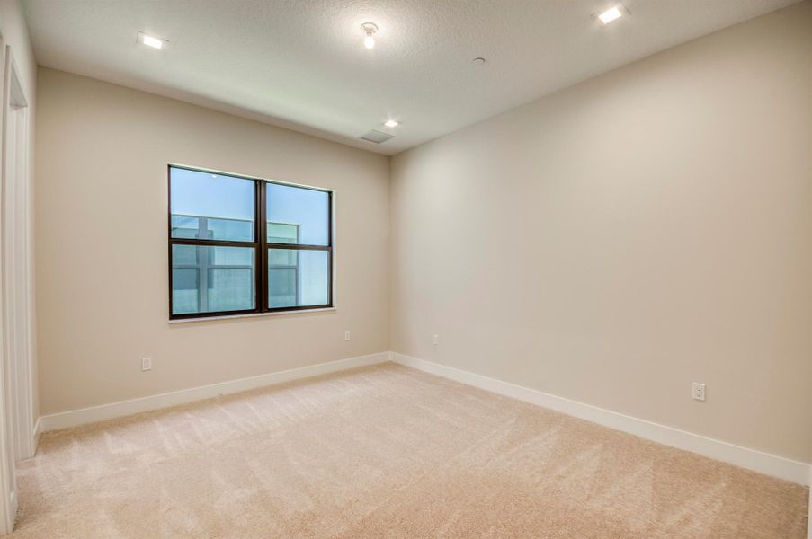 Furnished interior view inside a new home in Apex at Avenir, Palm Beach Gardens (Image 46).