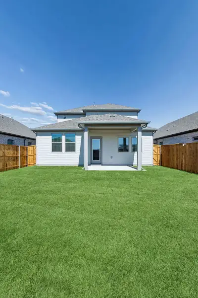 Covered Patio in the Mesquite home plan by Trophy Signature Homes – REPRESENTATIVE PHOTO Covered Patio in the Mesquite home plan by Trophy Signature Homes – REPRESENTATIVE PHOTO