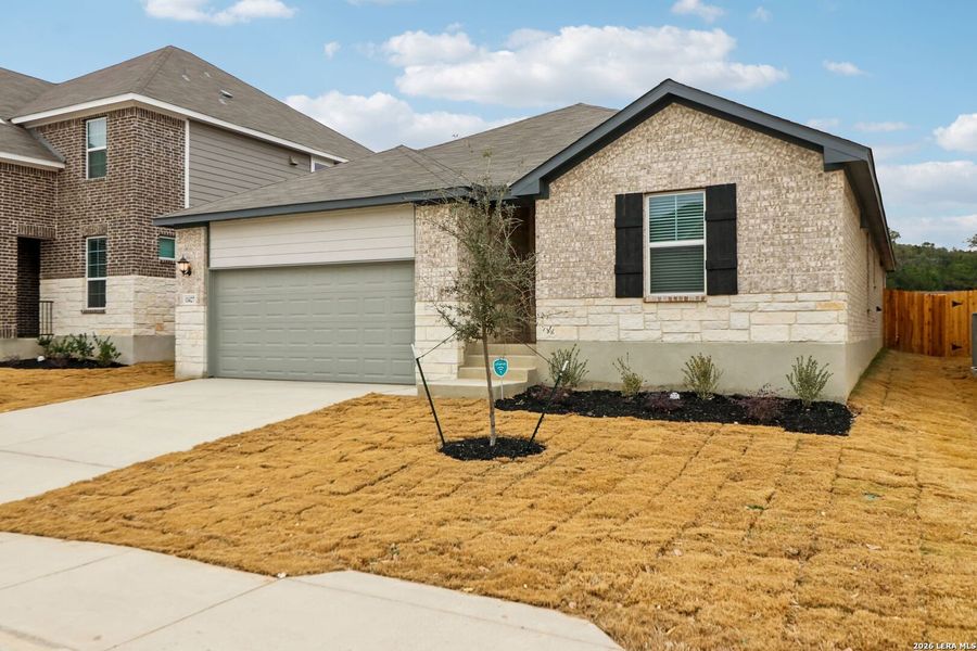 Front exterior of a new home in Sagebrooke - Classic Series, San Antonio, TX, highlighting curb appeal (Image 22).