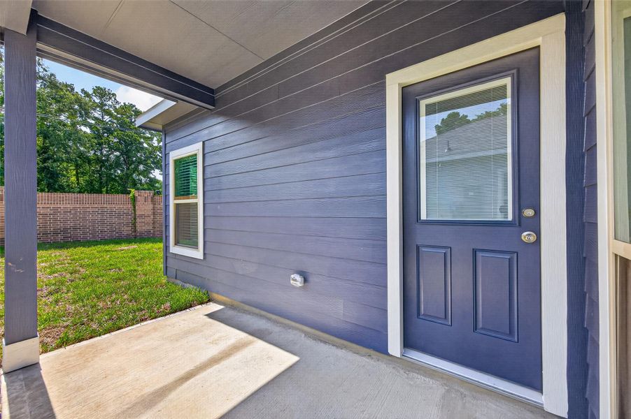 Exterior details and patio area of a home in Woodland Lakes, Huffman (Image 3). Exterior details and patio area of a home in Woodland Lakes, Huffman (Image 3).
