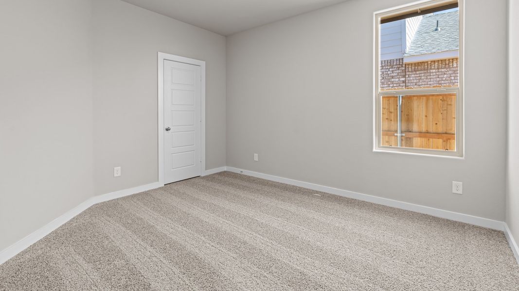 Representative unfurnished interior of a home built from the Jaxson by D.R. Horton in Legacy South, Midland (Image 29).