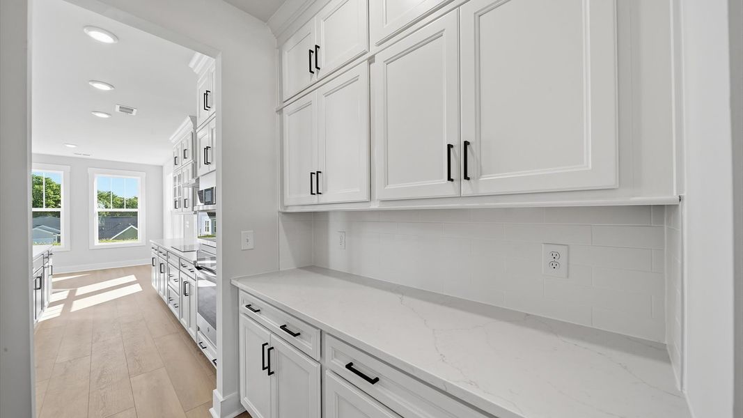 Furnished interior view inside a new home in Kayfield at Midway, Anderson (Image 8).