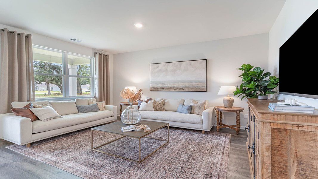 Representative furnished interior of a home built from the ARIA by D.R. Horton in Harper Meadows, Loris (Image 18).