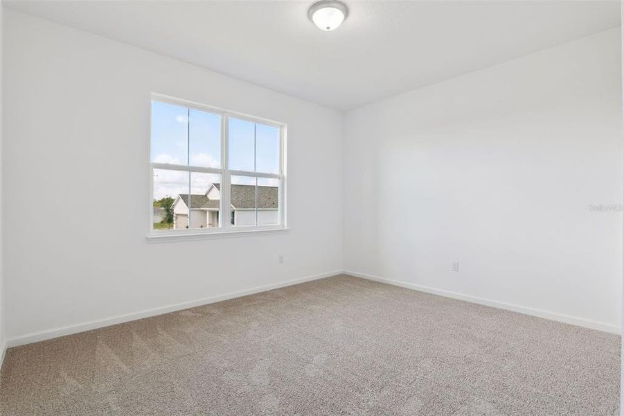 Spacious, unfurnished interior of a new home in Grand Isle, Grand Island (Image 26).