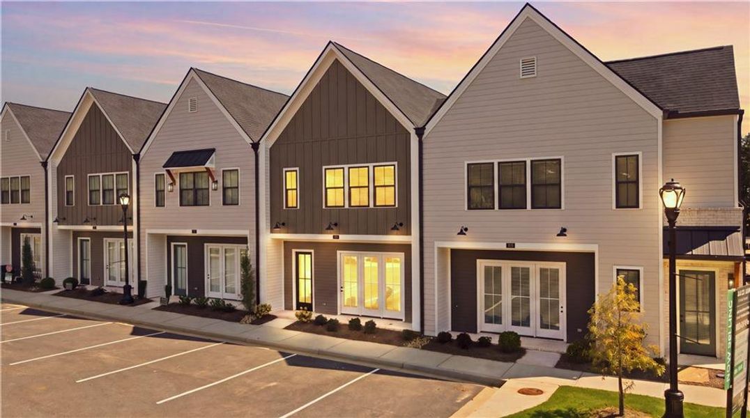Front exterior of a new home in , Braselton, GA, highlighting curb appeal (Image 32).