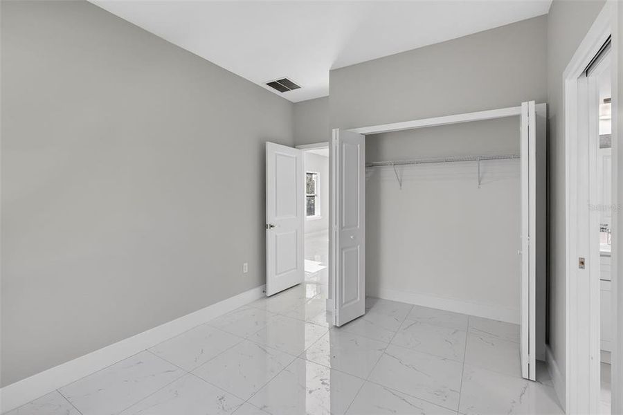 Spacious, unfurnished interior of a new home in , Port Charlotte (Image 37).