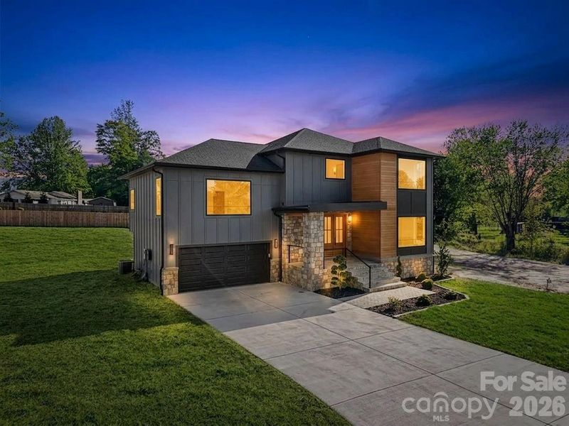 Front exterior of a new home in , Flat Rock, NC, highlighting curb appeal (Image 25).