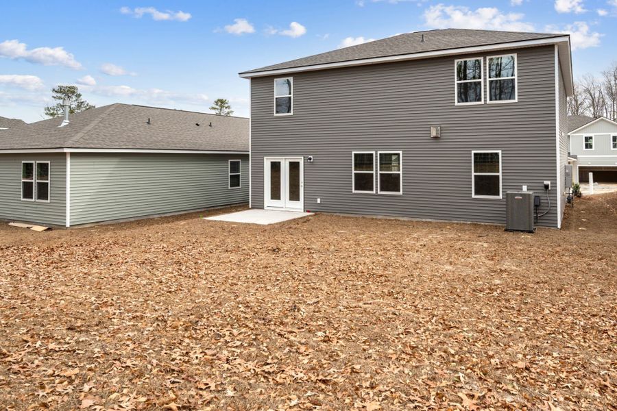 Exterior details and patio area of a home in Grand Arbor, Blythewood (Image 3).