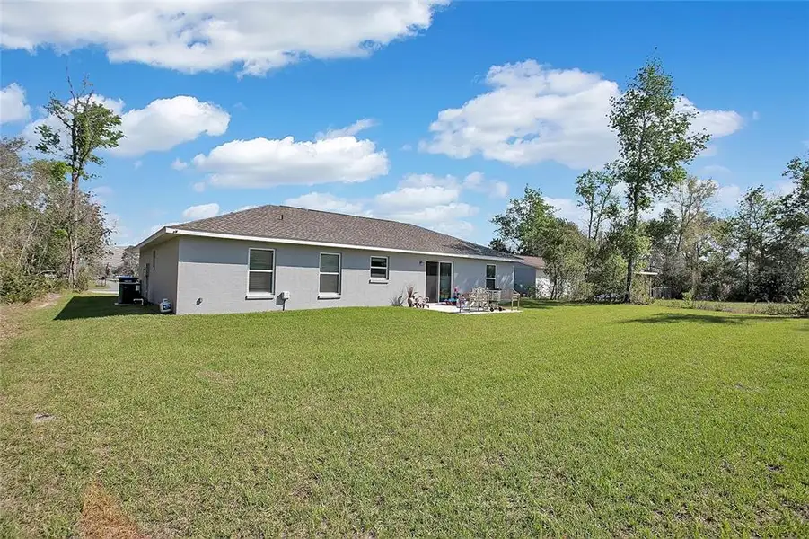 Exterior details and patio area of a home in , Ocala (Image 21).