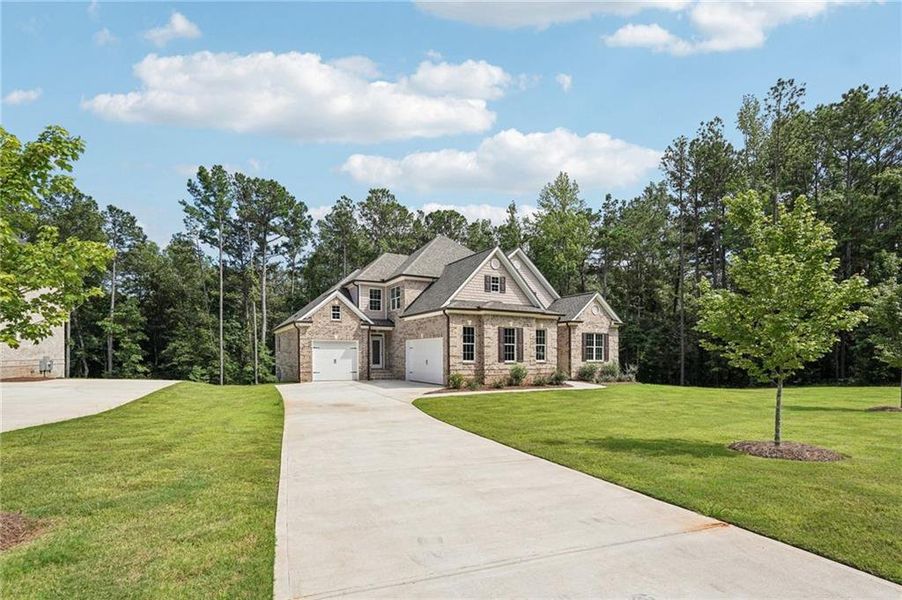 Front exterior of a new home in , Douglasville, GA, highlighting curb appeal (Image 23).